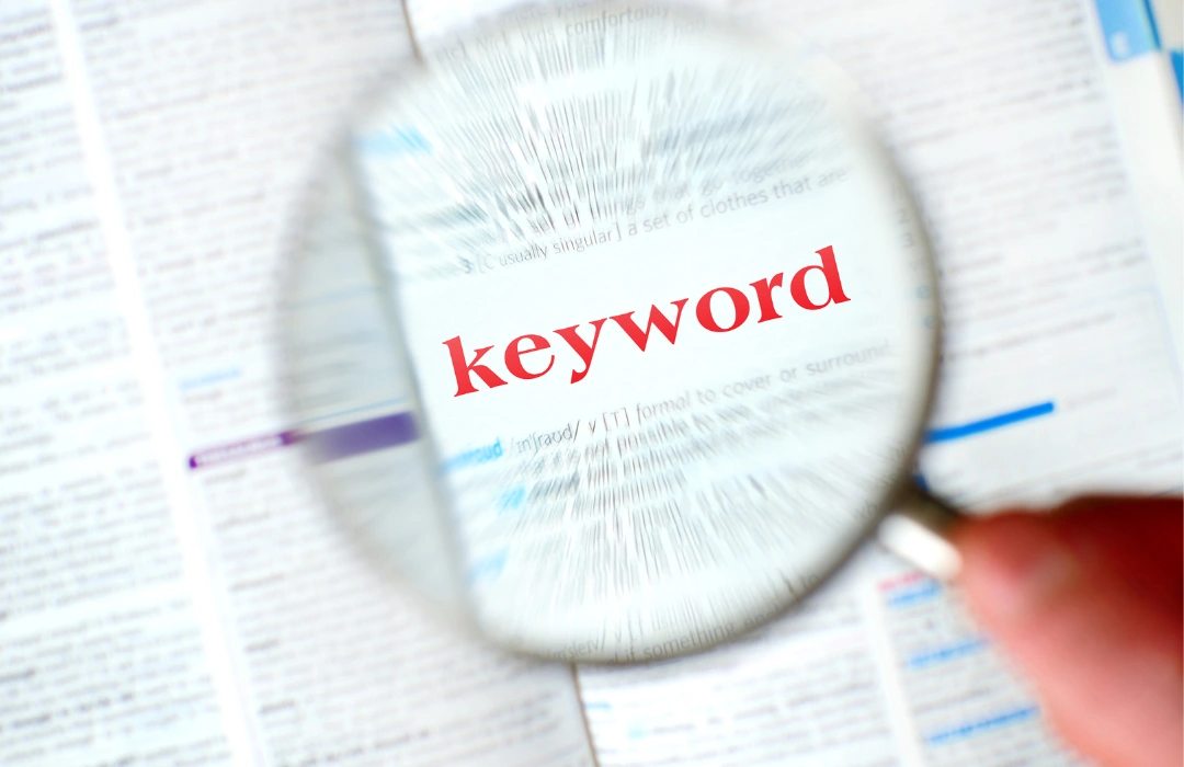 Keyword highlighted through magnifying glass – representing the importance of keyword research in SEO strategies by MaSs digital marketing expert